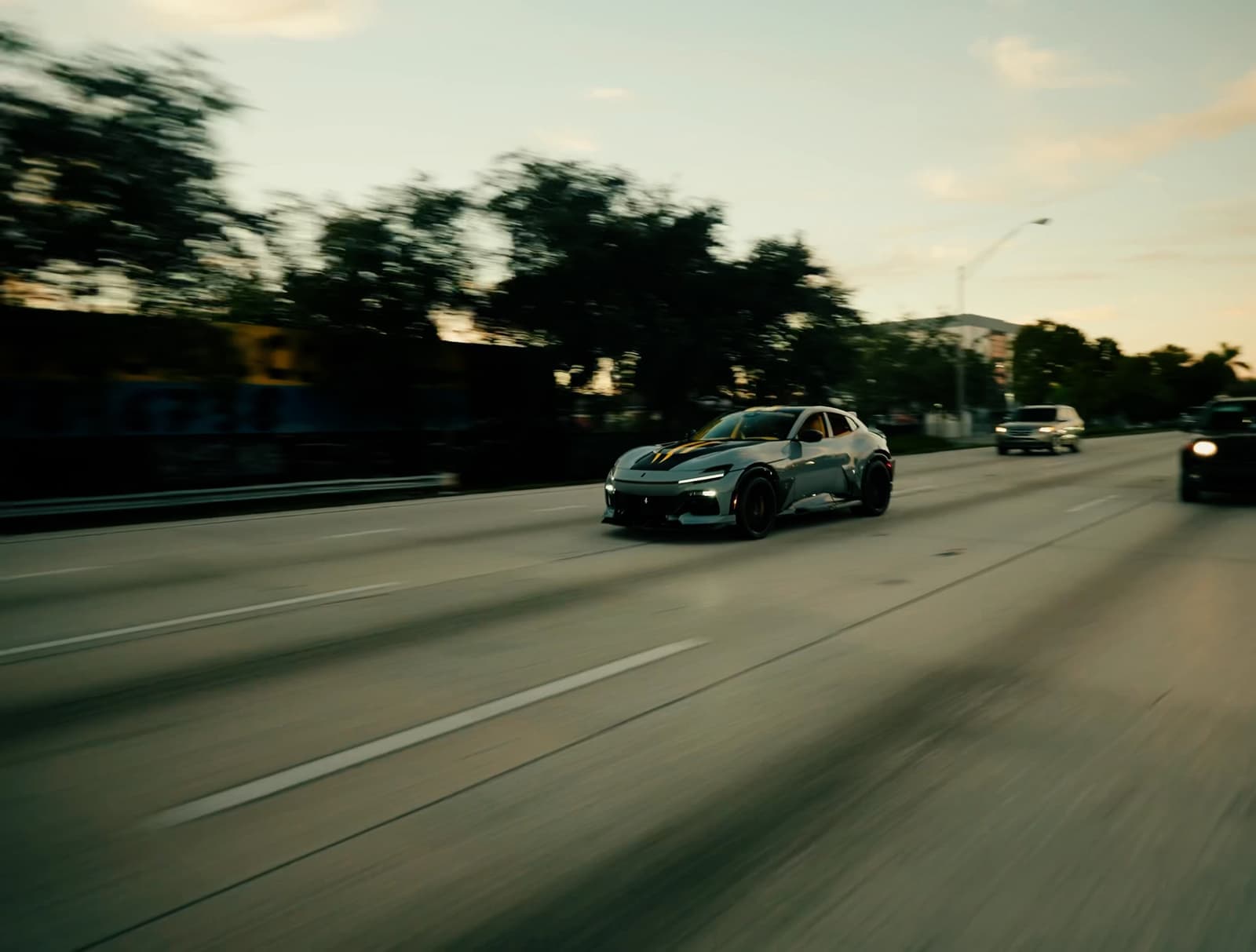 The one-of-one Ferrari Purosangue on the road in Miami at dusk
